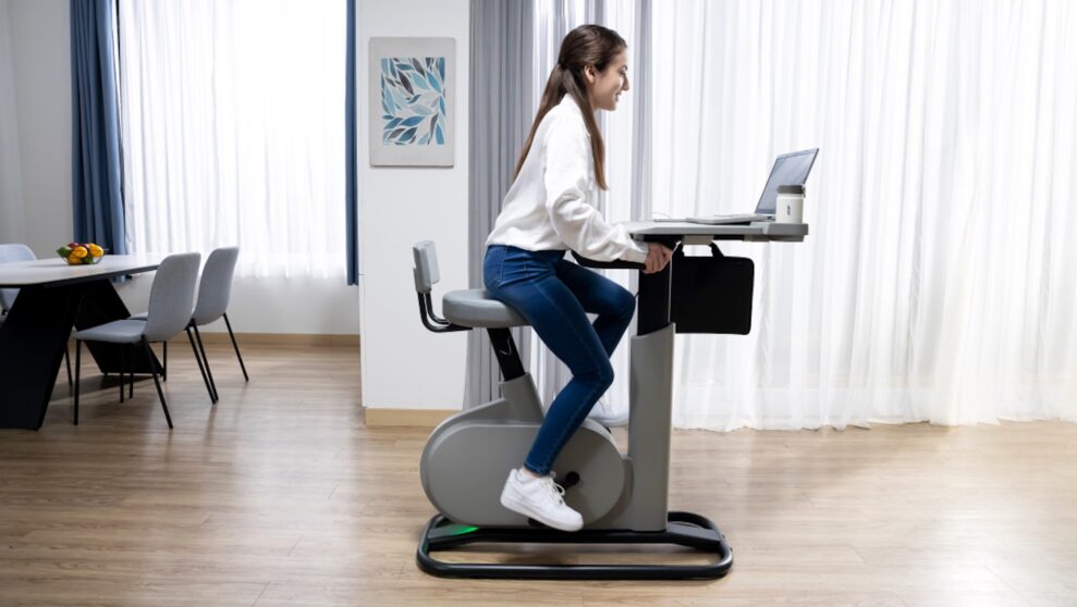 CES 2023: A computer desk with a built-in exercise bike